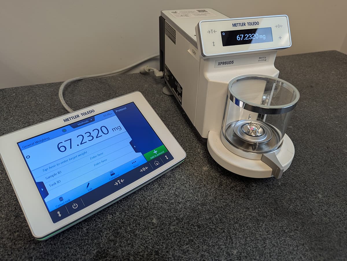 sample being weighed on a scale